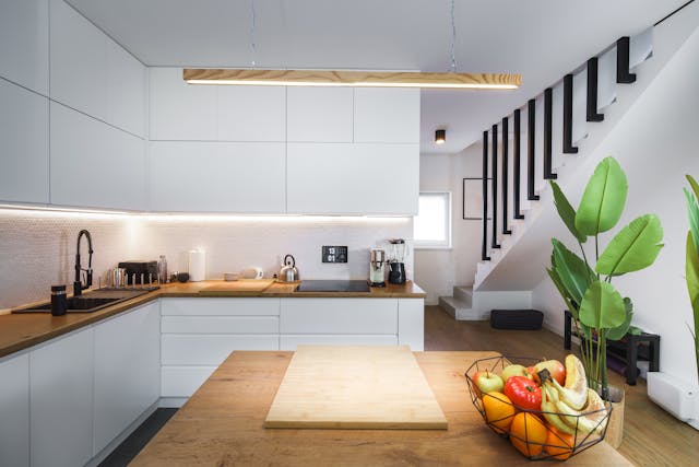 kitchen with white and light brown cabinets