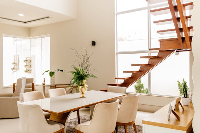 Interior of a modern home, dining room and staircase